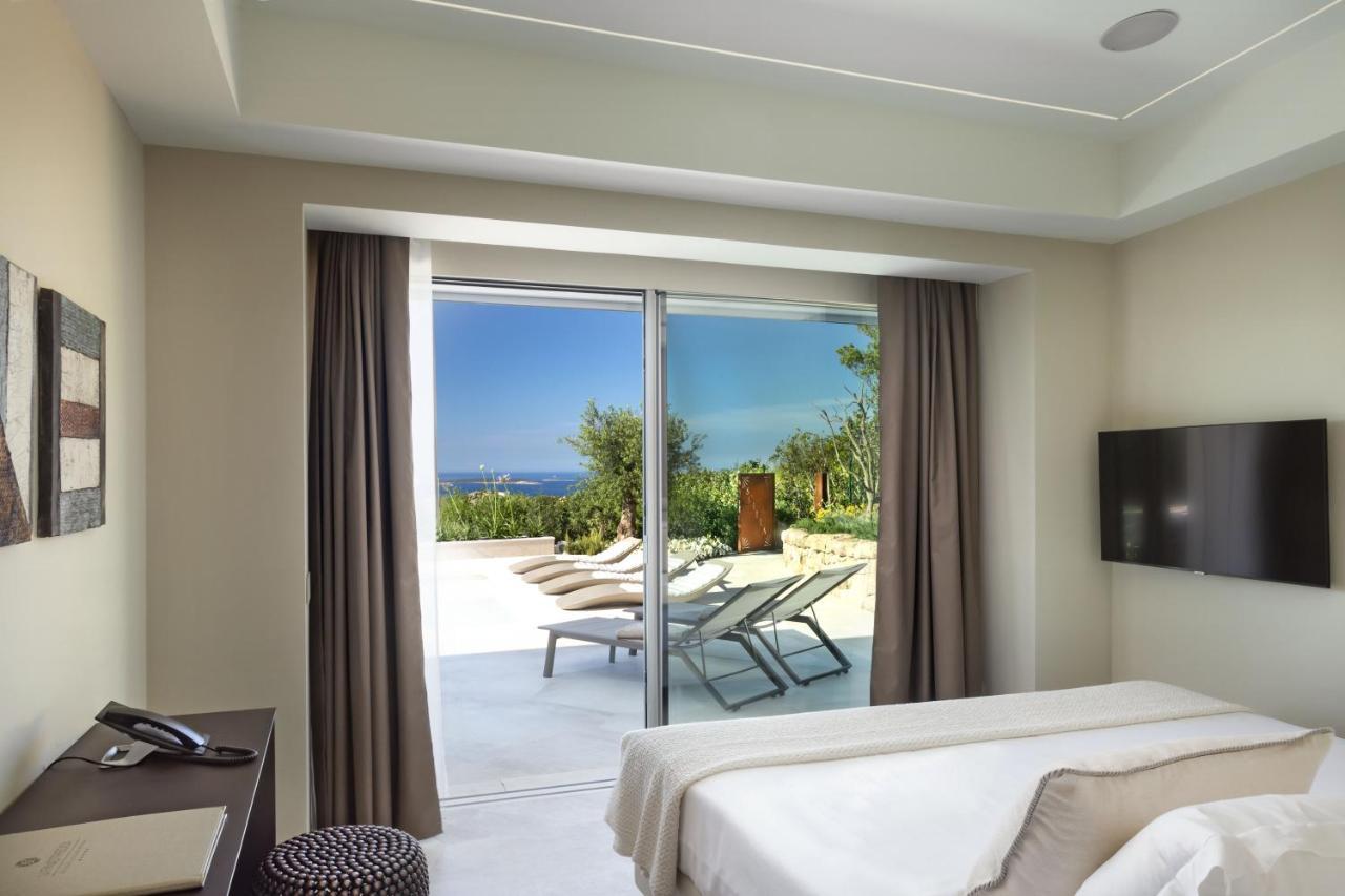 קניגיונה Hotel Li Finistreddi מראה חיצוני תמונה